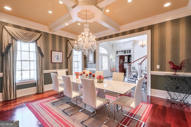 dining room with coffered ceiling, a healthy amount of sunlight, beamed ceiling, and ornamental molding