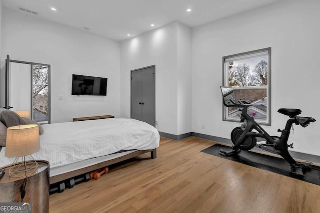 bedroom with light hardwood / wood-style floors