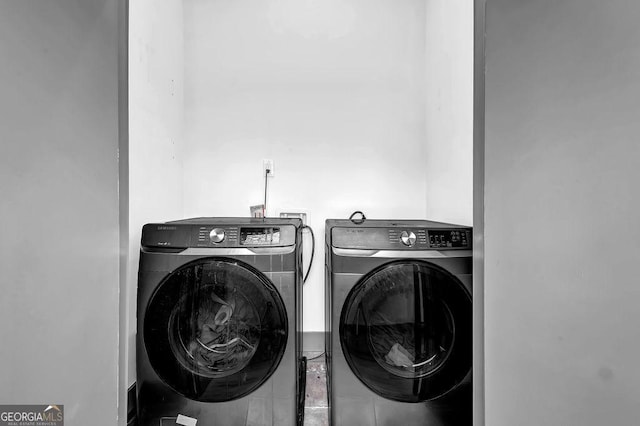 laundry area featuring separate washer and dryer