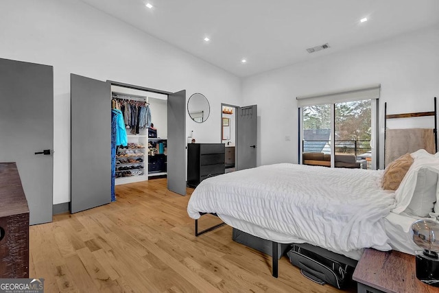 bedroom with hardwood / wood-style flooring