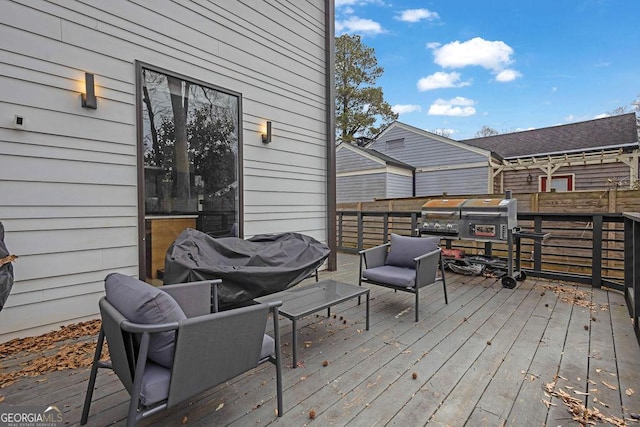 wooden deck with area for grilling