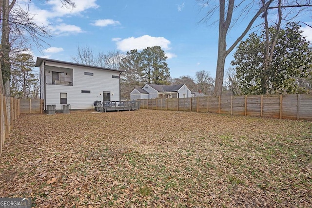 view of yard with a deck