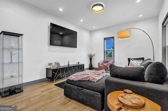 living room with light hardwood / wood-style floors