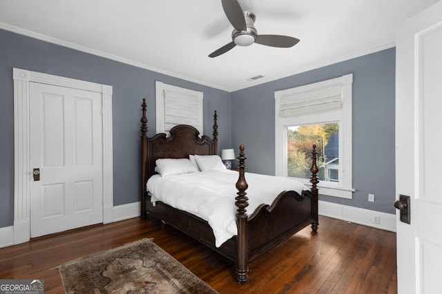 bedroom with ceiling fan and dark hardwood / wood-style floors