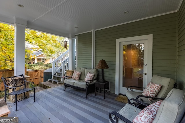 wooden deck featuring an outdoor living space