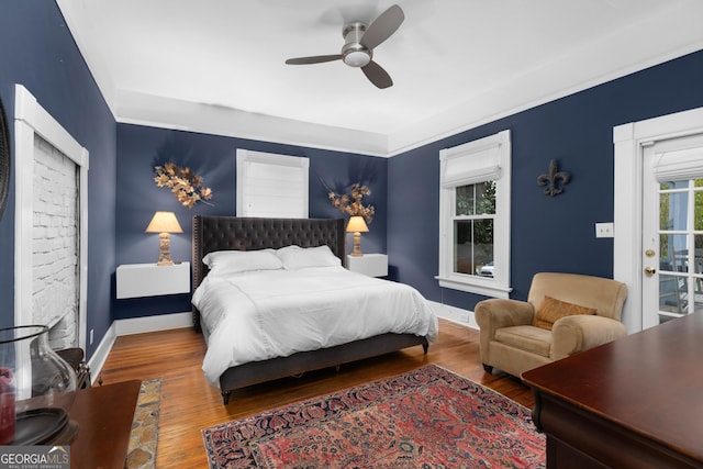 bedroom featuring ceiling fan and hardwood / wood-style floors