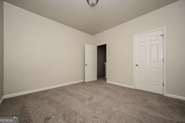 unfurnished bedroom featuring carpet floors