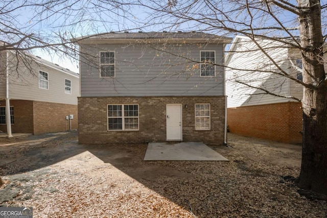 rear view of house featuring a patio area