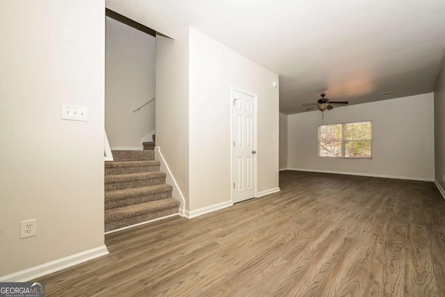 interior space with hardwood / wood-style floors and ceiling fan