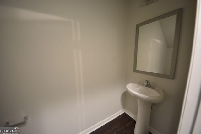 bathroom featuring hardwood / wood-style flooring