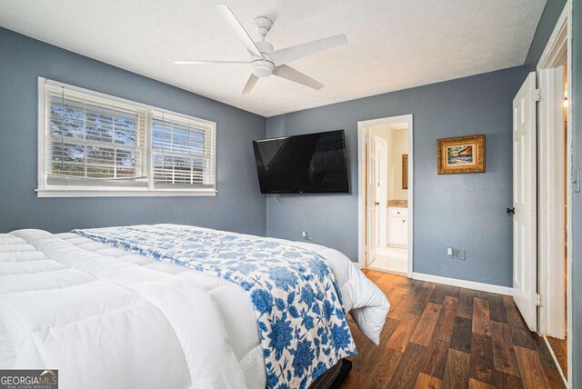 bedroom featuring dark wood-type flooring and ceiling fan