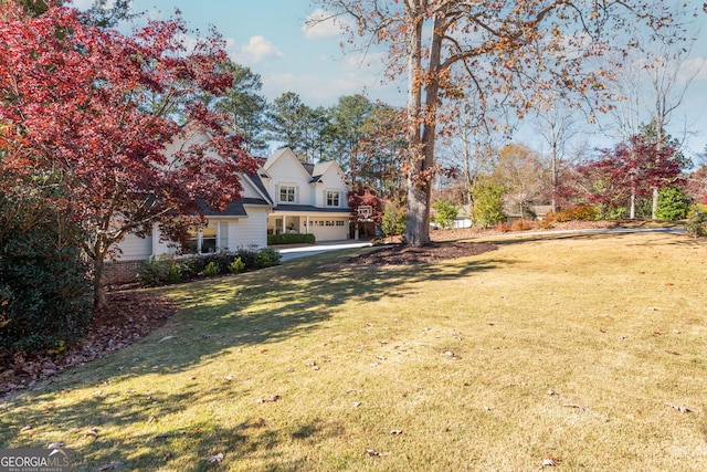 view of yard featuring a garage