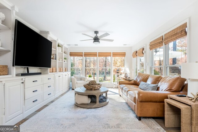 living room with ceiling fan