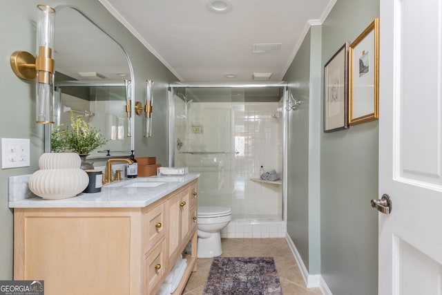 bathroom with an enclosed shower, vanity, crown molding, and toilet