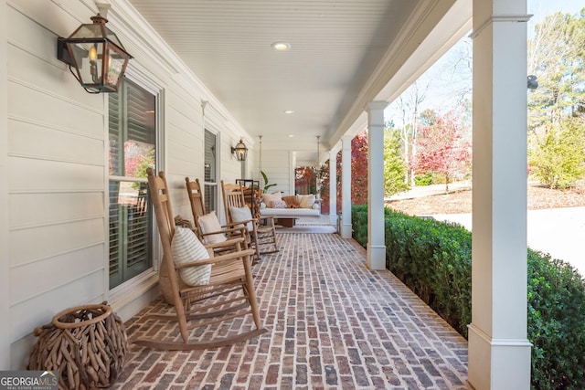 view of patio featuring covered porch