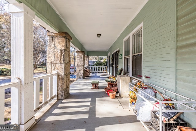 view of patio featuring a porch