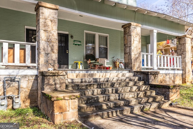 view of patio featuring a porch