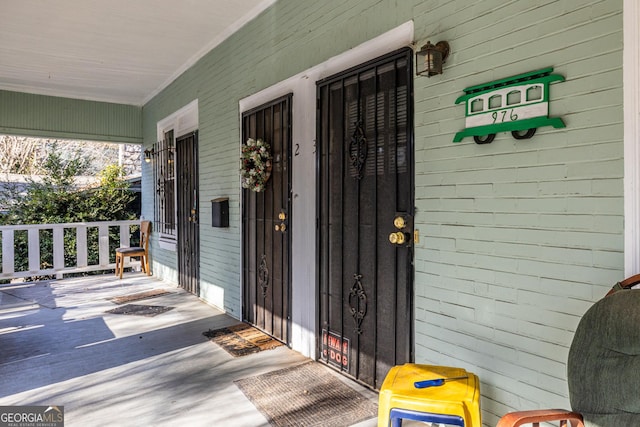 entrance to property with covered porch