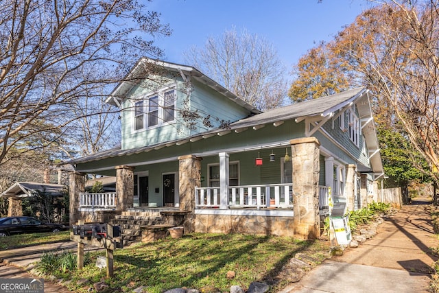 view of front of property featuring covered porch