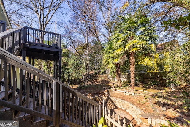 view of yard featuring a wooden deck