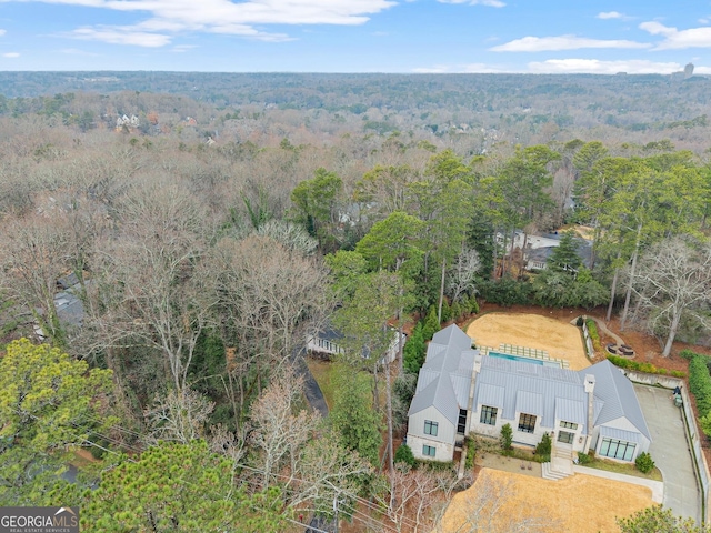 drone / aerial view with a forest view