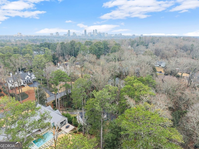 birds eye view of property with a view of city