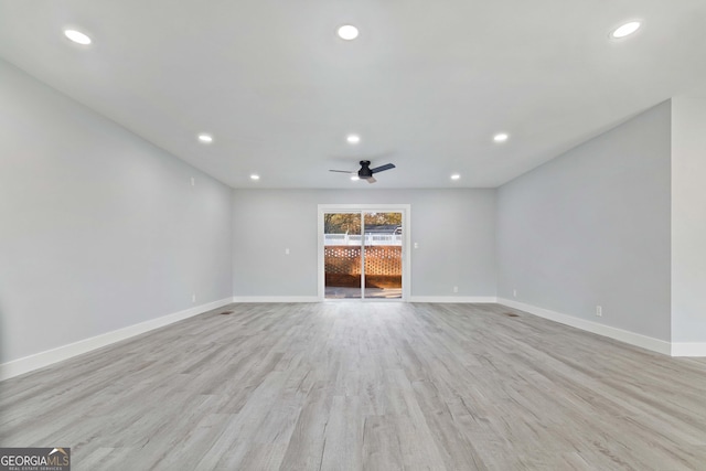 unfurnished room featuring ceiling fan and light hardwood / wood-style flooring