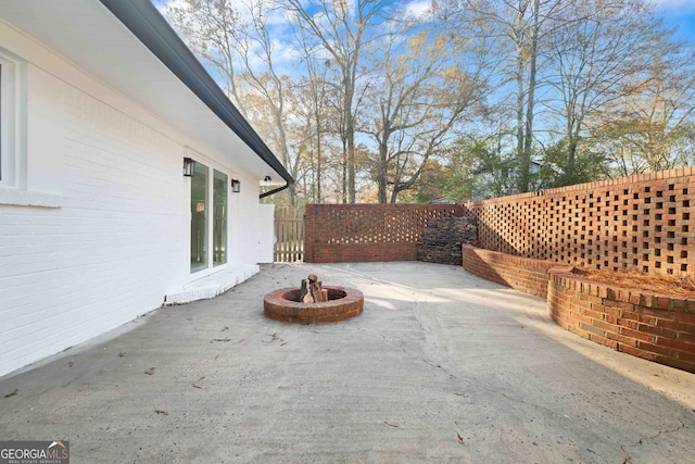 view of patio / terrace featuring a fire pit