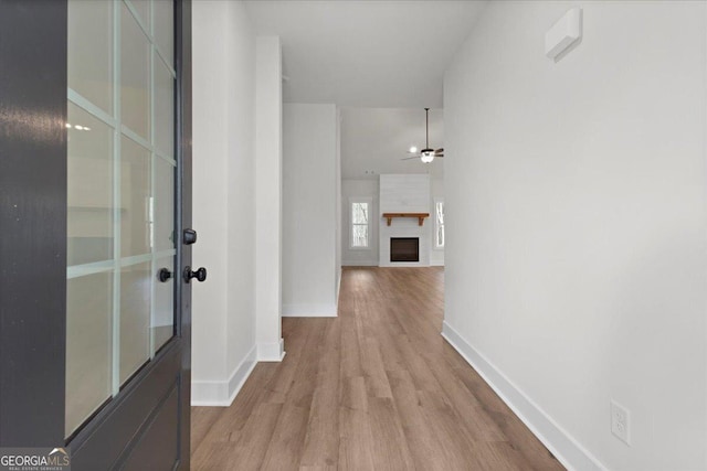 corridor featuring light wood-type flooring