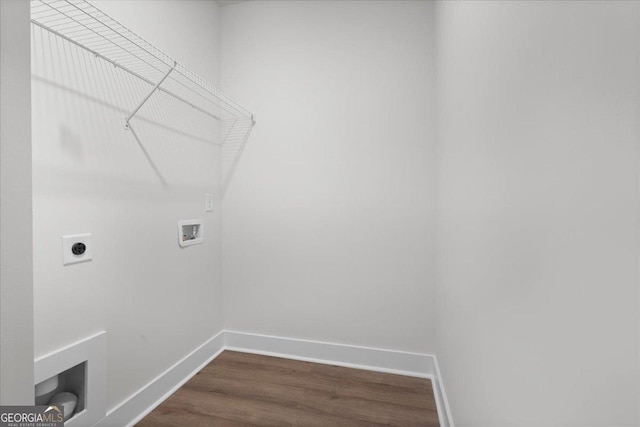 laundry area featuring hookup for a washing machine, dark hardwood / wood-style floors, and hookup for an electric dryer