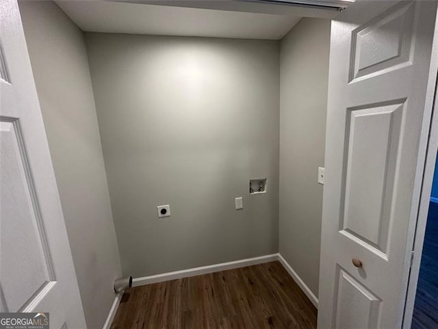 clothes washing area with hookup for a washing machine, dark hardwood / wood-style floors, and electric dryer hookup