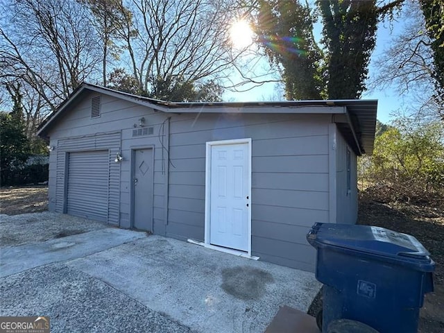 view of outdoor structure with a garage