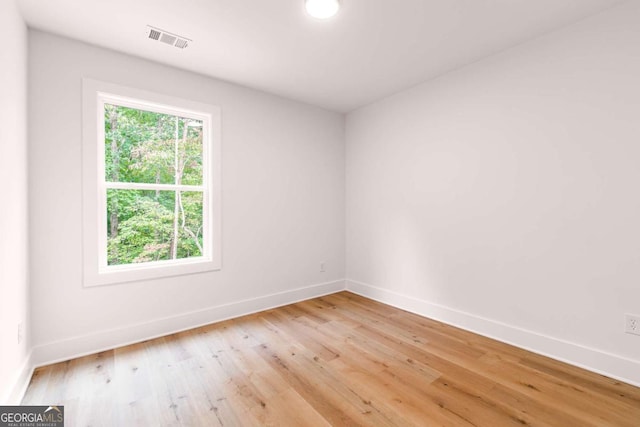 empty room featuring light hardwood / wood-style floors