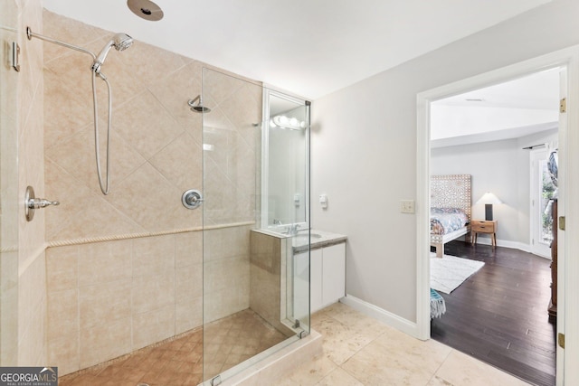 bathroom with an enclosed shower