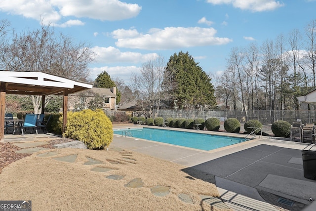 view of pool featuring a patio