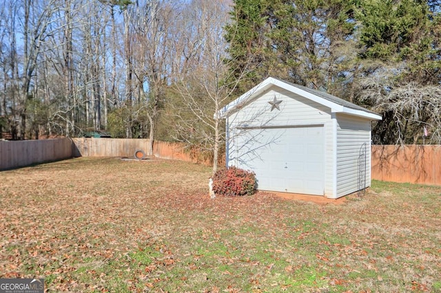 garage with a yard