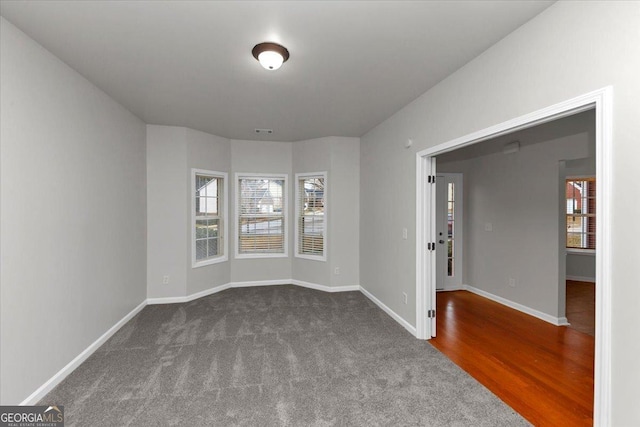 empty room featuring carpet flooring