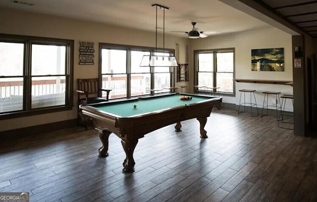 rec room with pool table, dark wood-type flooring, and a healthy amount of sunlight