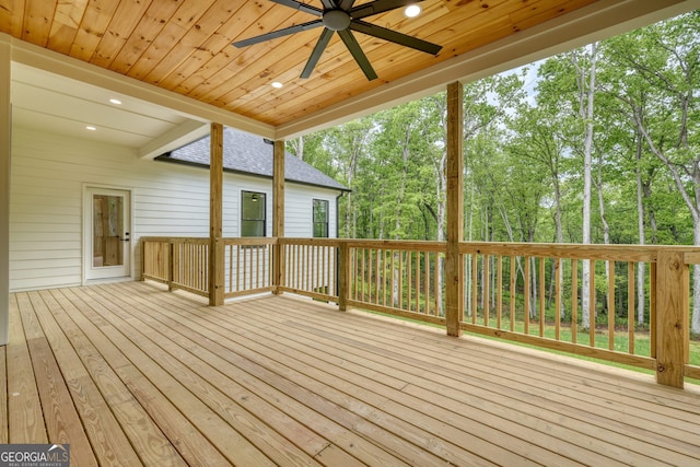 wooden terrace featuring a ceiling fan