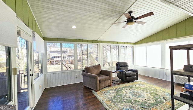 sunroom / solarium featuring vaulted ceiling and ceiling fan