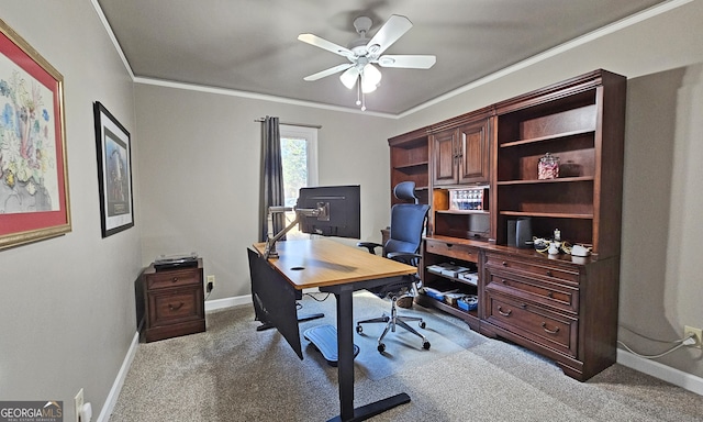 office area featuring ornamental molding, light colored carpet, and ceiling fan