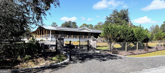 view of front of property featuring covered porch