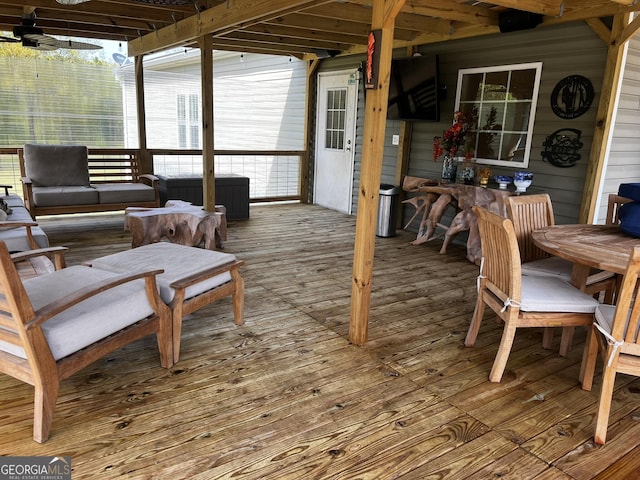 sunroom / solarium featuring plenty of natural light