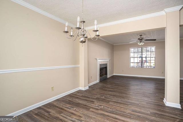 unfurnished living room featuring crown molding, dark hardwood / wood-style floors, ceiling fan with notable chandelier, and a textured ceiling