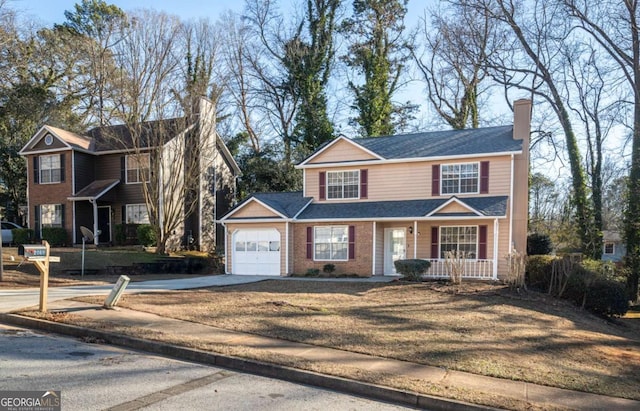 view of front facade featuring a garage and a porch