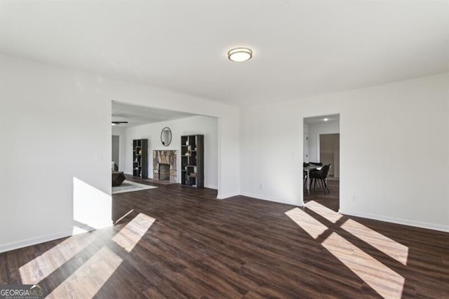 unfurnished room featuring dark hardwood / wood-style floors