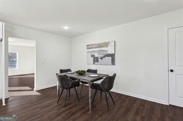 dining room featuring dark hardwood / wood-style floors