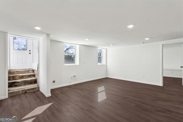 basement with dark wood-type flooring