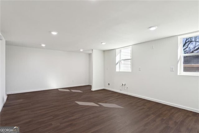 empty room featuring dark wood-type flooring