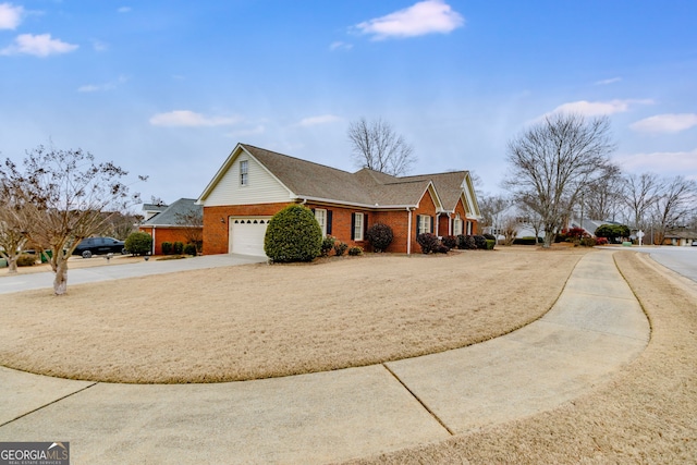 view of side of home with a garage